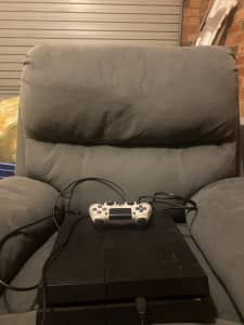 PS4 (slim addition) basically brand new. (Negotiable on price)
