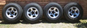 4x Toyo Open Country 235/85/16 with Landcruiser Mag Rims