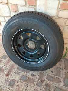 Free tyre (new) to suit 4WD