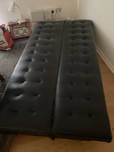 Black leather futon couch