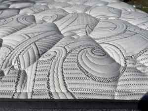 Kingkoil King size feather pillow top mattress