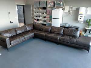 Leather modular lounge with chaise