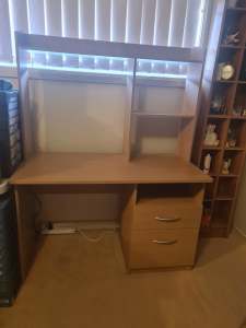 Desk with draws and storage shelves 