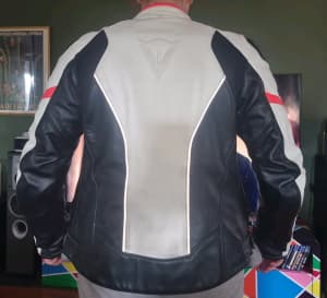 Italian leather Black and White dainese motorcycle Jacket and pants.
