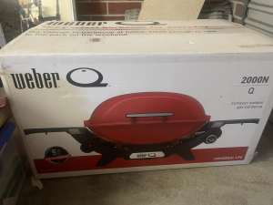Wanted: Weber Q 2000N . Comes with cover,portable cart. NEW IN BOXES