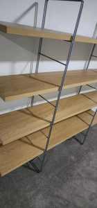 Stylish wooden shelves with metal stand