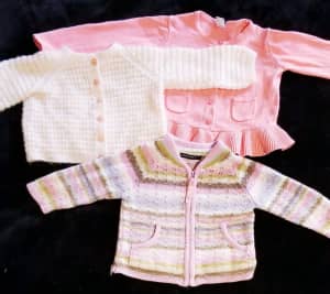 3 x girl's jumpers Size 0. 18-24 months aprox.