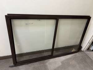 Brown Aluminium sliding window 900Hx1510W: Located at Wetherill Park