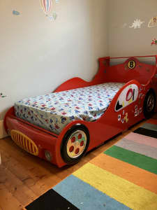 PENDING PICK UP Free kids bed some damaged pls read. Ferrari look
