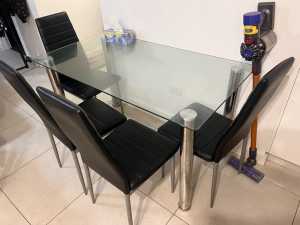 Glass Dinning Table with 4 leather chairs(pending pick up)