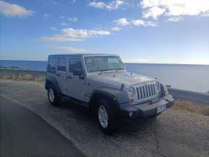 2010 JEEP WRANGLER UNLIMITED SPORT (4x4) 4 SP AUTOMATIC 4D SOFTTOP