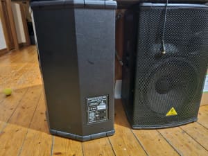 2x Behringer Eurolive B1520 Pro speakers and 1x Europower EP2000 Amp