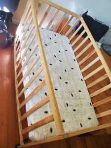 Hardly used cot with mattress 