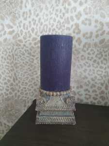 Blue/grey candle with grey pillar stand
