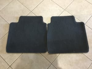 Two large rear floor mats new