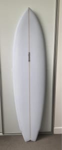 Moonshine 6’4” twin fin surfboard