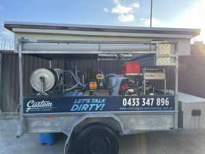 Pressure cleaner and soft washing trailer package