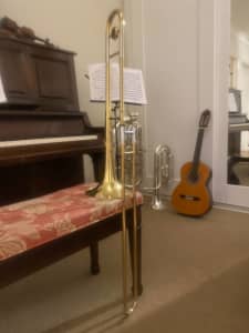 Gold Olds trombone with two mouthpieces 6BS 12B