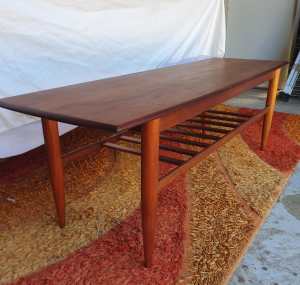 mid century restored teak coffee table with magazine rack 
