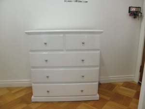 white dovetailed chest of drawers on rails