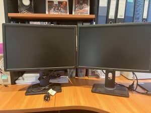 Two Dell computer monitors