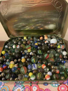 Two tins of MARBLES