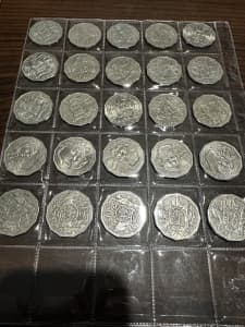 50c coin collection in plastic folder. 2/12