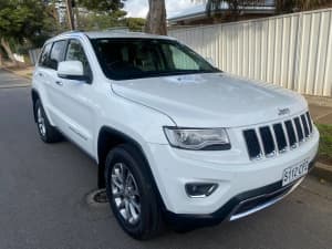 2014 Jeep Grand Cherokee Limited (4x4) 8 speed, factory air suspension