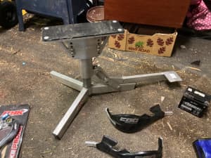 Dirt Bike Accessories- stand, battery, fork savers, guards $ 100 lot