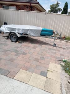 Car topper Canoe on trailer