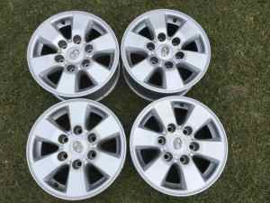 Four 15 Toyota Hiace Mag wheels. Comes with 24 genuine wheel nuts.