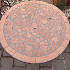 Terracotta tiled iron patio garden table