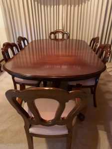 Reproduction mahogany dining suite. 8 chairs (2 carvers) extension