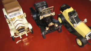 VINTAGE COLLECTABLES -- CARS, CUFF LINKS, BOTTLES, WALL DISPLAYS