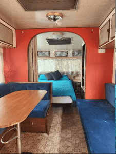 Private caravan with double bed and lounge