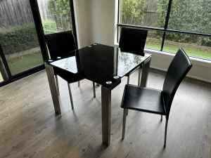 Square Dining table with three dining chairs