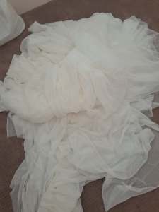 10 metres lengths of sheer white fabric