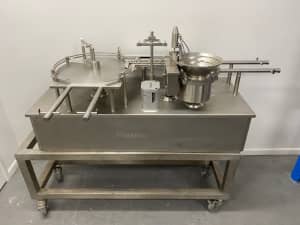FLEXICON ASEPTIC LIQUID FILLING AND STOPPERING/PLUGGING MACHINE/SYSTEM