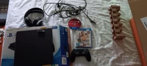 Playstation 4 500gb with headset and 2 games