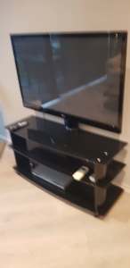 Black Glass TV unit with Attached LG Plasma TV