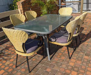 Outdoor glass and steel table and chairs