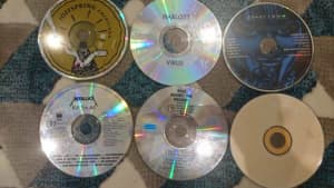 6 original music CDs without cases not great condition