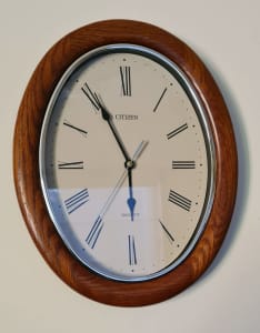 Citizen wall clock, oval timber frame, VG working order.