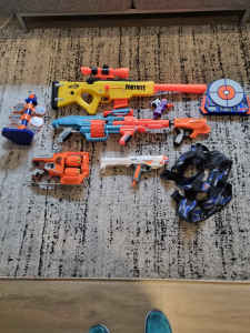 Nerf toy blasters and darts package.