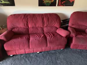 Red couch, three seater and two recliners