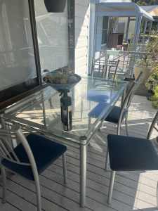 Wanted: Glass table and chairs