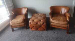 Tan leather chairs with matching Ottoman 