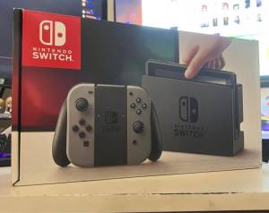 Nintendo Switch Original Grey (2019) with 2 Zelda games