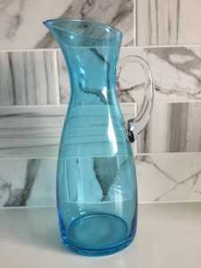 Tall turquoise blue jug