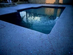 Exposed aggregate honed concrete seamless pools 